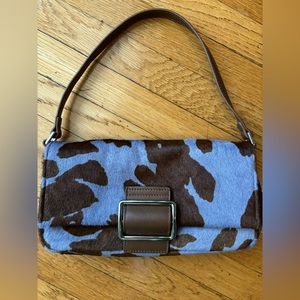 Urban Outfitters purple and brown shoulder bag with buckle.